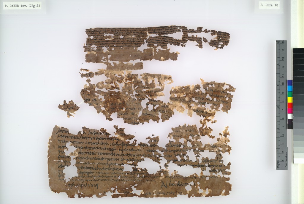 An archival photograph of a small archaeological document or object.